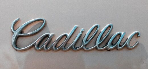Cadillac emblem representing the luxury electric Lyriq featured in our new and used Cadillac buying guide